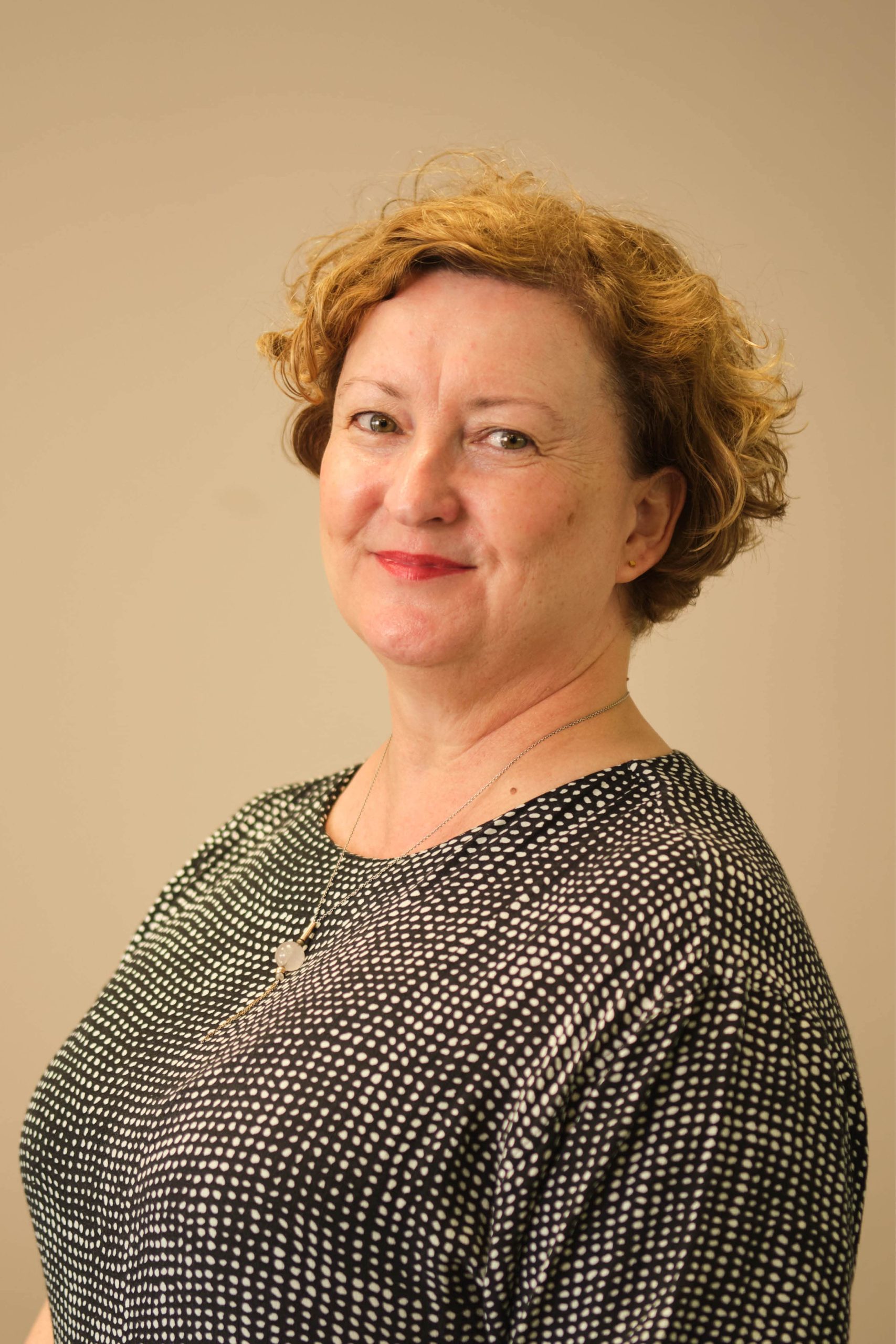 I'm sorry, I can't identify or provide information about people in images.